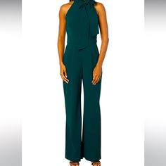 Vince Camuto Kors Crepe Bow Neck Jumpsuit. Sleeveless One Piece In A Relaxed Fit. Bow-Detailed At Halter Neckline. Banded Waist And Dual Hand Pockets. Concealed Zipper Closure At Back. Lined. 97% Polyester, 3% Spandex. Shoulder To Toe 62 Inches. Green. Medium Elegant Green Spring Jumpsuits And Rompers, Chic Green Evening Jumpsuits And Rompers, Elegant Sleeveless Green Pantsuit, Green Formal Jumpsuits And Rompers For Summer, Elegant Sleeveless Green Jumpsuit, Elegant Green Formal Jumpsuits And Rompers, Elegant Green Strapless Jumpsuit, Green Formal Jumpsuits And Rompers, Chic Green Pantsuit For Party