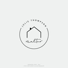 the logo for julie thomas realty, which is located on top of a white background