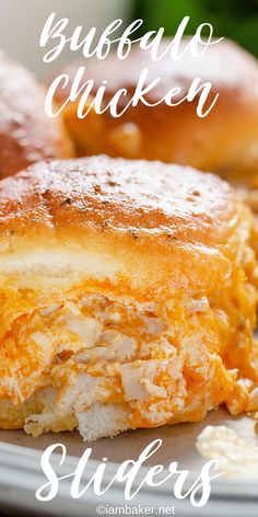 a close up of food on a plate with the words, buffalo chicken sliders