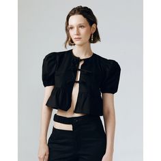 This crop top exuding flair and sophistication, ideal for elevating any ensemble with a dash of refined style.  How to Wear It: High-Waisted Bottoms: Pair with skirts or trousers. Layered: Wear under blazers or jackets. Accessorize: Add statement jewelry for a chic touch. Hand Wash Light Ironing Do Not Bleach Modern Black Crop Top For Summer, Modern Fitted Cropped Blouse, Elegant Cropped Tops For Evening, Elegant Cropped Evening Tops, Chic Black Cropped Crop Top, Evening Cropped Top, Cropped Top For Evening, Modern Black Crop Top For Spring, Modern Fitted Black Crop Top