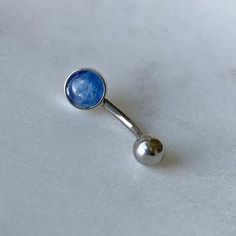 "KYANITE Belly Button Ring/316L Surgical Steel/Hypoallergenic/14 Gauge Body Jewelry/Gift for Her/Birthday Present/Piercing ** Ships out in 1-2 business days! ** ~ These Hypoallergenic bellybutton rings feature a beautiful Natural Blue Kyanite Cabochon. ~ Perfect for sensitive skin, making a great gift choice for the \"hard to buy for\" or even a gift for YOURSELF! 💕 M A T E R I A L S: - Genuine Blue Kyanite - 316L Surgical Steel HYPOALLERGENIC!! DIMENSIONS: - Bar 14 gauge & 12mm in Length ( Adjustable Hypoallergenic Silver Belly Rings, Gift Sterling Silver Round Belly Rings, Hypoallergenic Silver Belly Rings As Gift, Hypoallergenic Silver Belly Rings For Gift, Adjustable Blue Belly Rings As Gift, Blue Kyanite, Premium Gift, Belly Button, Belly Rings