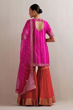 Magenta pink kurta with sequin, zari, aari embroidery in stripe pattern. Paired with red gharara and dupatta. - Aza Fashions Red Gharara, Raw Silk Embroidery, Pink Kurta, Kurta Patterns, Aari Embroidery, Magenta Pink, Silk Embroidery, Silk Organza, Raw Silk