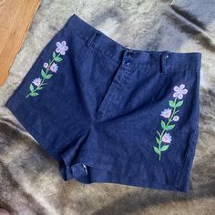 "60s 70s era true vintage dark blue denim shorts with embroidered floral details 🍒🌼 such a perfect pair of shorts we've had this in are archives for a minute and they need to be adored by someone special 🌼🍒 waist 29\" hips 38\" rise 12\" length 13\"" Vintage Floral Embroidered Bottoms For Summer, Fitted Retro Denim Shorts, Retro Fitted Denim Shorts, Retro Embroidered Denim Bottoms, Embroidered Dark Wash Bottoms For Summer, Blue Cotton Jean Shorts With Floral Embroidery, Vintage Embroidered Summer Bottoms, Dark Wash Embroidered Bottoms For Summer, Retro Embroidered Bottoms For Spring