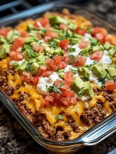 a casserole dish with meat, cheese and vegetables