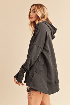 Embrace ultimate comfort with this oversized hoodie pullover, perfect for post-workout or leisure time. It boasts a button-up neckline and boldly ribbed piecing, adding a touch of style. The front pouch pocket and thumbholes at cuffs enhance functionality, while the dropped dolman sleeves ensure a relaxed fit. Stay cozy and fashionable in this go-to sweatshirt for any occasion. -Color: Hunter green -Oversized fit -Content: 100% Cotton -Hand wash/ Lay flat to dry -Imported -Model is wearing size Drop Shoulder Hoodie, Hoodie Pullover, Leisure Time, Personalized Hoodies, Effortless Elegance, Hooded Pullover, Comfortable Fashion, Fashion Sense, Stretchy Material