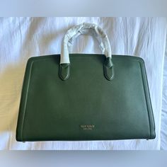 Kate Spade Green Pebbled Leather Commuter Laptop Bag. Perfect For Travel, The Office, Heading To A Coworking Space Or Cafe. Adds A Nice Sleek And Fun Touch To Business Attire. Never Used And New With Tags! Kate Spade Saffiano Leather Bags For Daily Use, Luxury Green Bags For Work, Luxury Green Workwear Bag, Luxury Green Bag For Work, Green Textured Leather Bags For Work, Green Workwear Bag With Detachable Handle, Kate Spade Business Top Handle Bag, Luxury Green Kate Spade Shoulder Bag, Kate Spade Saffiano Leather Business Bag