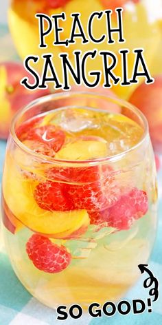 a glass filled with fruit on top of a table