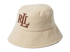 Lauren Ralph Lauren Cross Dye Canvas Bucket Hat with Tacked Logo - Traditional Hats : Natural/Dark Natural : Enjoy featherlight comfort and get optimal sun protection wearing the LAUREN Ralph Lauren Cross Dye Canvas Bucket Hat with Tacked Logo. It features durable canvas construction with cross-dye finish and embossed signature logo on the front. Pull-on style. 50% cotton, 50% polyester. Spot clean. Imported. Classic Beige Bucket Hat, Luxury Beige Bucket Hat, Summer Cotton Bucket Hat, Washed, Ralph Lauren Bucket Hat, Cream Cotton Bucket Hat, One Size, Ralph Lauren Hats, Heeled Rain Boots, High Heel Rain Boots, Shoe Boot Sandals