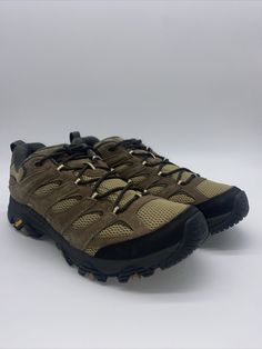 Experience the great outdoors with these stylish and durable Merrell Moab 3 Waterproof sneakers. Designed for hiking enthusiasts, these shoes come in a sleek Kangaroo/Coyote color and are available in Men's Size 14. The shoes are made of high-quality leather and have medium width, making them comfortable for all-day wear. These sneakers are part of the popular Merrell Moab product line and feature a waterproof design that's perfect for outdoor activities in any weather. The shoes have a sneaker style that's perfect for casual wear as well. Whether you're an avid hiker or simply looking for a comfortable and stylish pair of sneakers, these Merrell Moab 3 Waterproof shoes are the perfect choice. Box has no lid Brown Trail Running Shoes With Vibram Sole For Outdoor, Functional Brown Trail Running Shoes For Outdoor, Casual Brown Trail Running Shoes For Outdoor, Brown Functional Walking Shoes For Adventure, Functional Brown Walking Shoes For Adventure, Durable Low-top Waterproof Boots For Outdoor, Breathable Brown Hiking Boots For Outdoor Activities, Brown Breathable Waterproof Boots For Outdoor Activities, Breathable Brown Waterproof Boots For Outdoor Activities