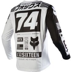 a white and black jersey with the number 74 printed on it's back side