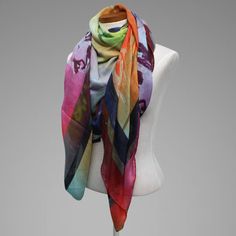 Scarf - This lightweight floral bandana is truly artful, showcasing a print of an original oil painting by Jennifer Bauser. Printed on a lightweight cashmere/modal blend, its a versatile little luxury, with a semi sheer fabric and a slightly larger-than-average size. A beautiful accent piece, its also the perfect size for a classic wrist wrap or head scarf. Printed in Italy with machine-rolled hem. Bohemian Multicolor Scarf With Abstract Print, Bohemian Multicolor Scarves With Abstract Print, Multicolor Floral Print Scarf, One Size, Artistic Floral Print Scarves For Spring, One Size Multicolor Floral Print Scarf, Multicolor Silk Scarf With Abstract Print For Spring, Artistic Multicolor Silk Scarf With Floral Print, Bohemian Scarf With Abstract Print, Artistic Summer Shawl Scarf