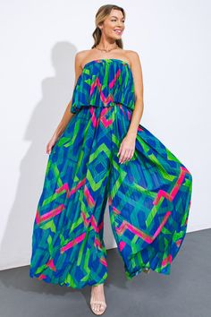 Elevate your wardrobe with our intricately pleated, printed woven jumpsuit. Featuring a straight neckline, flounce detail, and an elasticized waist to accentuate your figure, this piece embodies sophistication and style. Complete the look with statement accessories and embrace the luxury of our wide-leg design.Details:Self : 100% PolyesterLining : 100% PolyesterSize & Fit- Model is 5`8" And Wearing Size Small- Measurements Taken From Size Small- Approx. Length: 50" Lounge Party, Pleated Jumpsuit, 50th Clothing, Business Baby, Flying Tomato, Strapless Jumpsuit, White Party, Vacation Dresses, Set Dress