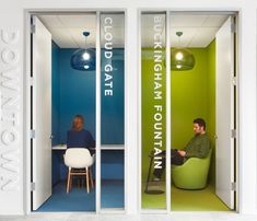 a man and woman sitting on bean chairs in a room with green walls, blue flooring and white trim