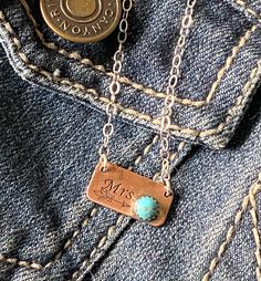 This personalized initial necklace can be customized with 3 characters. This copper pendant includes a 5mm Kingman turquoise stone and a hand stamped arrow. A boho style necklace to give to a friend, sister or your Mom. Makes a perfect gift for girls and women. Layer this with other charm necklaces or wear a lone. Made of solid sterling silver that hangs on a sterling silver flat cable chain.  Like it just the way you see it with Mrs on it? Perfect gift for new wife or bride.  Customize it!!  Pl Blue Initials Jewelry As A Gift, Blue Initials Jewelry For Gift, Personalized Turquoise Sterling Silver Necklaces, Personalized Sterling Silver Turquoise Necklaces, Personalized Blue May Birthstone Jewelry, Personalized Blue Jewelry For May Birthstone, Blue Stamped Jewelry For Gifts, Personalized Adjustable Turquoise Jewelry, Blue Stamped Necklace As Gift