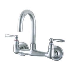 a chrome faucet with two handles and nozzles on the side,