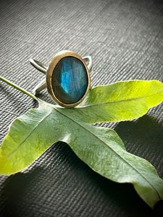 Handcrafted Sterling Silver and Gold Filled  Ring with Labradorite .  Approximate size 6.75 Handmade Opal Open Ring For Gift, Handmade Opal Open Ring Gift, Handmade Minimalist Moonstone Ring, Handmade Minimalist Moonstone Open Ring, Unique Handmade Moonstone Promise Ring, Handmade Minimalist Open Moonstone Ring, Handmade Spiritual Open Opal Ring, Handmade Open Opal Ring For Gift, Artisan Rings With Natural Stones For Gift