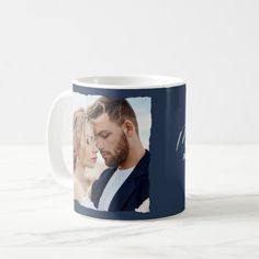 a coffee mug with an image of a man and woman