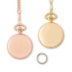 two gold colored pocket watches with chain and ring on white background, one is empty