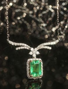 •Condition: Brand new•Center Stone: Natura emerald from Zambia, Emerald Cut, 0.9ct, 7x5mm•Side Stone: Natural white diamond, round cut, 0.31ct total (VS1 clarity and F color) •18k Solid White GoldEach piece is made-to-order with care and special attention to detail. all items are made with conflict-free diamonds and gems.The item will be gift wrapped and shipped.---------------------------------------------------------Available in :14k Rose or Yellow Gold, White Gold18k Rose or Yellow Gold, Whit Dazzling Formal Emerald Gemstone Necklace, Exquisite Brilliant Cut Emerald Necklace, Luxury Emerald Cut Emerald Necklace For Anniversary, Elegant Emerald Cut Emerald Necklace For Formal Occasions, Formal Emerald Necklaces With Diamond Cut, White Gold Diamond Emerald Necklace With Hallmark, Exquisite White Gold Necklace With Emerald Cut, Dazzling Emerald Necklace For Formal Occasions, Formal Brilliant Cut Emerald Pendant Necklace