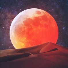 the full moon is seen over sand dunes