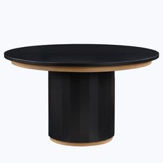 a round table with black top and wooden base