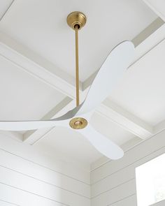 The Maverick 52 in Matte White w Burnished Brass features an 85.0 X 28.0 6-speed motor with a Thirteen-degree blade pitch. With a sleek modern silhouette, a DC motor, and super energy-efficiency, the 52" Maverick ceiling fan features softly rounded blades and elegantly simple housing. Maverick has a 52-inch blade sweep and a 3-blade design that delivers a distinct profile and incredible airflow for living rooms, great rooms, or outdoor covered areas. It includes a hand-held remote with six speed Maverick Ceiling Fan, Brass Ceiling Fan, 60 Inch Ceiling Fans, Ceiling Fan Makeover, Propeller Ceiling Fan, Ceiling Fan Bedroom, 52 Inch Ceiling Fan, Ceiling Fans Without Lights, Ceiling Fan Blades