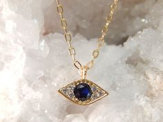 "EVIL EYE NECKLACE | GIFT FOR HER Keep the protective gaze of the Evil Eye over you with this sparkling CZ evil eye necklace, featuring an Evil Eye charm adorned with crystals. It's the perfect necklace to give as a special gift for your person or yourself! IT'S IN THE DETAILS ✦ 14K Gold Filled Chain and components ✦ Dainty Gold Plated over Brass Evil Eye Charm with sparkling CZ crystals approx. 10mm ✦ Lead and Nickel free ✧ Necklace is shown at 17\" ✧ Also available as a bracelet or ankle brace Blue Necklaces With Diamond Eyes As Gift, Blue Necklace With Diamond Eyes As Gift, Kabbalah Bracelet, Symbol Of Protection, Evil Eye Necklace Gold, Eye Gift, 16 Inch Necklace, Your Person, Protection Necklace