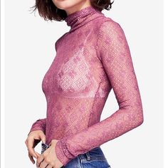 Sheer Embroidered Turtleneck Top Featuring Long Sleeves And A Floral Design. Stretch Fit Foldover Turtleneck Care/Import Hand Wash Cold Measurements: Bust: 30” Length: 24.5” Sleeve Length: 28” Pink Fitted Lace Top, Chic Floral Embroidery Lace Top, Lace Tops With Floral Embroidery For Fall, Floral Embroidery Lace Tops For Fall, Purple Lace Tops For Spring, Purple Lace Top For Spring, Trendy Spring Lace Top, Chic Pink Lace Top, Fitted Floral Embroidery Tops For Winter