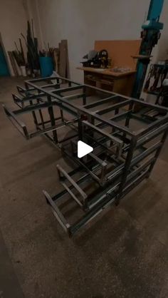 a metal frame sitting in the middle of a room