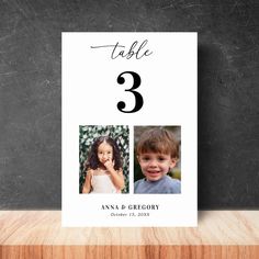 a table number card with two photos on it and the numbers three in black ink