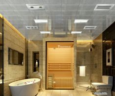 a bathroom with a tub, toilet and sink in it's own area that is lit up by recessed lights