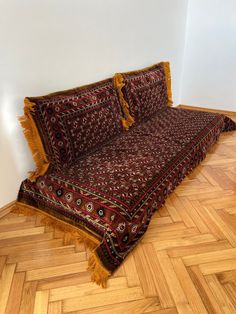 a couch that is sitting on the floor