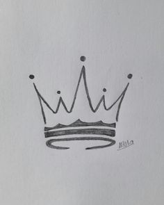 a drawing of a crown on top of a piece of paper