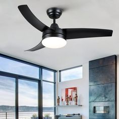 a ceiling fan in a modern living room