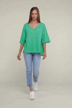 Elevate your casual wardrobe with the Brushed Waffle Top, a stylish and comfortable piece featuring side slits, exposed seam details, and a trendy hi-low hem. Crafted from a blend of polyester, rayon, and spandex, this top offers a relaxed yet flattering fit that's perfect for everyday wear. Shop at #FashionTrends #CasualStyle #WardrobeEssentials #ComfortFashion #EverydayWear #StylishComfort Trendy Tops With Frayed Hem For Day Out, Fall Cotton Tops With Crinkle Texture, Casual Tops With Crinkle Texture For Layering, Trendy Tops With 3/4 Sleeves For Brunch, Textured Casual Tops For Loungewear, Trendy Loungewear Tops With Frayed Hem, Trendy Frayed Hem Tops For Loungewear, Casual Textured Tops For Layering, Trendy Green 3/4 Sleeve Top