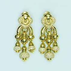 Chandelier Gold Diamond Earrings. Impressive chandelier 18K gold diamond earrings. The striking elegance of these chandelier earrings is exceptionally stunning. Measurements: Length: 2.5" Width: 1.1"Weight: 71.8 Grams Luxury Vintage Gold-tone Earrings, Exquisite Diamond Chandelier Earrings In Gold, Gold Chandelier Earrings With 17 Diamonds, Luxury Gold Diamond Chandelier Earrings, Traditional Gold Diamond Chandelier Earrings, Impressive Chandelier, Chandelier Gold, Yellow Gold Diamond Earrings, Genuine Love