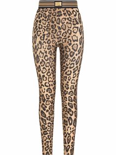 Brown leopard-print leggings from DOLCE & GABBANA featuring all-over leopard print, stripe trim, gold-tone logo plaque, high-waisted, super-skinny cut and stretch-design. | Dolce & Gabbana Leopard-Print Leggings Lou Lou Lemon Leggings, Brown Cow Print Leggings, Metallic Pleated Skirt, Leopard Print Leggings, Leopard Print Blouse, Leggings Design, Dolce E Gabbana, Dolce & Gabbana, Printed Leggings