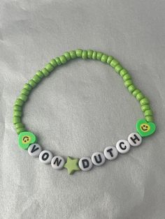 💚 Charli XCX friendship bracelet - Von Dutch 💚 Perfect for the Brat tour or as a gift 💚 Brat green beads, neon green heart smiley face bead, green star and black letters 💚 Comes beautifully wrapped Handmade Green Heart-shaped Bracelet, Customized Green Bracelets As Gift, Adjustable Green Heart-shaped Beaded Bracelets, Handmade Green Heart Bracelets, Handmade Green Heart-shaped Bracelets, Handmade Green Heart Bracelet, Customized Green Name Bracelet For Friendship, Customizable Green Bracelet Jewelry, Customizable Green Name Bracelet Gift