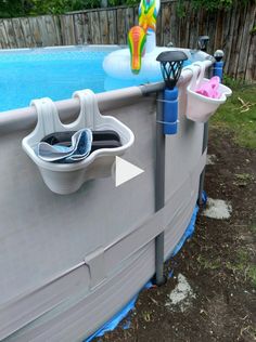 an above ground swimming pool with various items in it