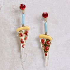 These clever little hand-enameled earrings are fanciful femininity personified.  We've fallen in love with these precious pizza slices!  The Pizza Pizza Earrings make an adorable statement and conversation piece.  Be utterly unique by adding these earrings to your collection!  Approximately 2.5 inches long Hypoallergen Enamel Drop Earrings For Party, Fun Nickel-free Enamel Jewelry, Nickel-free Enamel Fun Jewelry, Nickel-free Enamel Jewelry With Fun Style, Fun Enamel Earrings For Gifts, Pizza Earrings, Shrinky Dink Jewelry, Dna Art, Micro Mosaic Jewelry