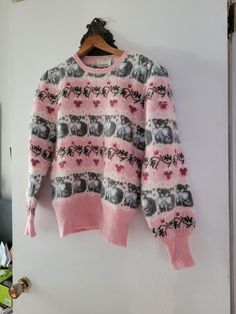 Vintage 80s Novelty cat sweater embroidered  pink wool sweater BY Susan Bristol size 36 78% Shetland Wool, 17% Angora, 5% Nylon Excellent condition.   Please check measures for better fit: Condition: Excellent  Bust: 38" Length: 28" Shoulder to Shoulder : 15 " Sleeve: 25" Pink Fair Isle Pattern Top For Fall, Pink Fair Isle Pattern Sweater For Fall, Pink Fair Isle Sweater For Fall, Pink Crew Neck Sweater With Fair Isle Pattern, Pink Fair Isle Crew Neck Sweater, Vintage Pink Tops For Winter, Pink Fair Isle Sweater For Winter, Pink Fair Isle Winter Sweater, Cat Sweater