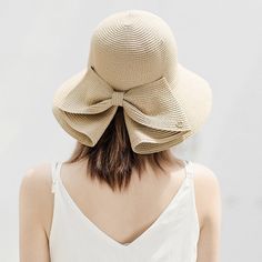 Elegant and Functional: The Perfect Summer Accessory Introducing the Women’s Summer Simple Sun Hat – your ultimate companion for sunny days. Designed with elegance and functionality in mind, this stylish hat features small eaves and a charming bow, making it perfect for beach outings, outdoor adventures, or casual strolls. Made from natural straw, this collapsible hat combines sophistication with practicality, ensuring you stay protected from the sun while looking effortlessly chic. Product Features Stylish Bow Design: The bow adds a touch of femininity and elegance to this classic sun hat. Adjustable Size: Fits head sizes 54-58cm, ensuring a comfortable and secure fit for all. Small Eaves: The 6cm brim provides just the right amount of shade, perfect for sunny days. Collapsible and Portab Chic Sun Hat With Bow For Vacation, Chic Vacation Sun Hat With Bow, Chic Straw Hat With Bow For Vacation, Chic Vacation Straw Hat With Bow, Chic Sun Hat With Bow For Kentucky Derby, Chic Sun Hat With Bow For Summer, Chic Bow Sun Hat For Summer, Chic Summer Sun Hat With Bow, Chic Beach Sun Hat With Bow