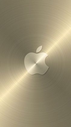 an apple logo on a metallic surface