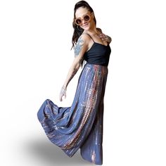 Add a pop of color and boho vibes to your wardrobe with our these Tie Dye Wide Leg Palazzo Pants. These flowy tiered pants can be dressed up or down for any occasion. Don't be afraid to get creative with your style! Free Size, will fit sizes up to an XL best Waist 24-36", Inseam 26", Front/Back Rise 16", Length 42" Hips: up to 50" Rayon Fair Trade made in Nepal Handwash or machine wash delicate Air Dry/Tumble Dry Low Please take a moment to look over all shop policies before purchasing. Flowy Bohemian Maxi Skirt For Day Out, Bohemian Flowy Maxi Skirt For Day Out, Bohemian Maxi Skirt With Elastic Waistband For Day Out, Flowy Wide-leg Maxi Skirt For Day Out, Bohemian Rayon Maxi Skirt For Spring, Summer Wide Leg Rayon Maxi Skirt, Summer Wide Leg Maxi Skirt In Rayon, Spring Hippie Harem Pants With Relaxed Fit, Spring Hippie Relaxed Fit Harem Pants