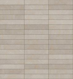 a beige tile wall with vertical lines on the top and bottom, as well as an area for text