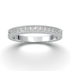 a white gold wedding band with princess cut diamonds