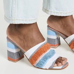 Bohemian Block Heel Sandals For Spring, Chic Mules For Summer Outings, Trendy Summer Mules With Woven Sole, White Woven Sandals For Spring, White Block Heel Summer Mules, Woven Block Heel Sandals For Summer, Summer Woven Sandals With Block Heel, Modern Mules With Woven Sole, Modern Block Heel Mules For Summer