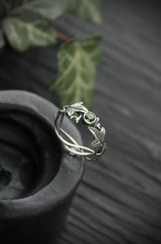 ITEM DESCRIPTION: The size of ring 7 (US and Canada) O (UK and AU) I can make it any size you want - just mark your size in the order Weight - 2 g. This botanical ring with ivy leaves looks so delicate and dainty. I made it of sterling silver and dark green chrome diopside. This Elven ring will be a great addition to your jewelry collection or a special piece for Engagement. This handmade ring will come to you in a gift box - ready for gifting. The parcel will be sent 1-2 days after payment. Del Nature-inspired Open Ring For Promise, Green Promise Rings With Nature-inspired Style, Silver Emerald Open Ring For Promise, Green Nature-inspired Promise Rings, Sterling Silver Green Promise Ring, Green Sterling Silver Promise Rings, Unique Green Promise Ring, Nature-inspired Solitaire Rings For Gifts, Nature-inspired Round Promise Rings