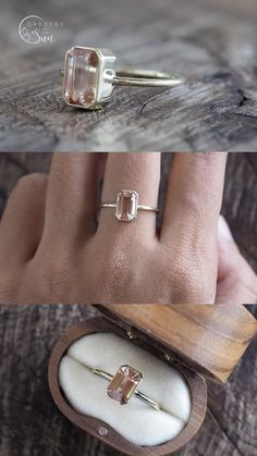 a woman's hand with two rings in it and an empty ring box on the table