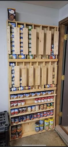 a wooden shelf filled with lots of food